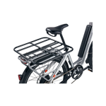 up close view of black rack platform mounted on the back of a silver city bike 