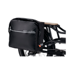 Zoom in on fully-loaded black Ballard Cargo Bag on the rack of a black RadWagon ebike.