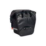 Close up rear and side view of black Fremont Pannier Bag with carrying handle, attachment clips for rear rack and silver reflective strip on the lower side wall.