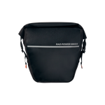 Close up side view of black Fremont Pannier Bag rolled closed with side straps attached and silver reflective strip across the side.