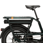 The right side of a green bike with a range extender under the rear rack. 