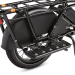 RadWagon Running Boards shown installed on the right side of a RadWagon 5 electric cargo bike. Cast aluminum foot boards that attach to the ebike and allow a passenger to rest their feet. 